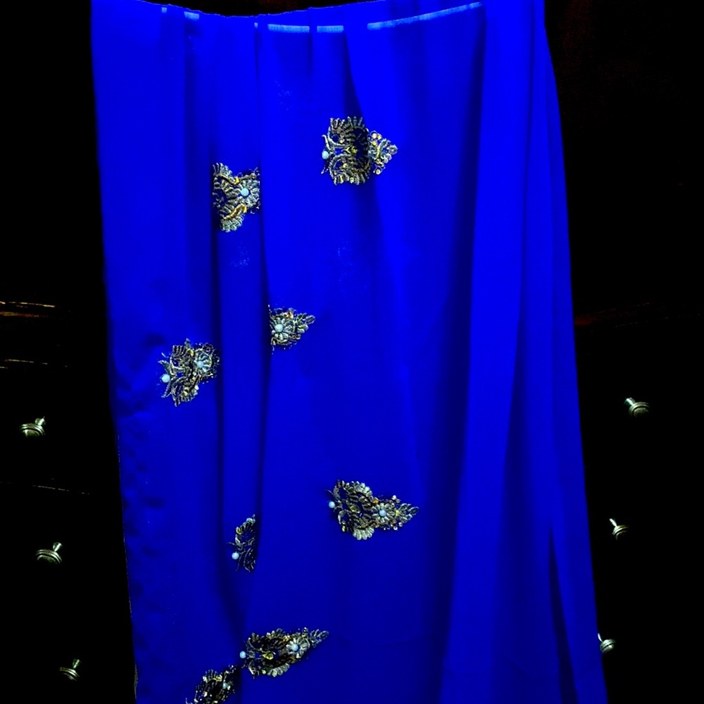 Almost new very nice party ware saree royal blue and golden  combination.